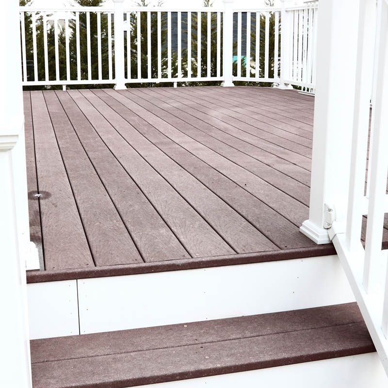 A new composite deck with white railings